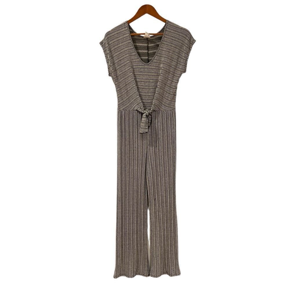 Caution to the wind patterned romper. Size medium